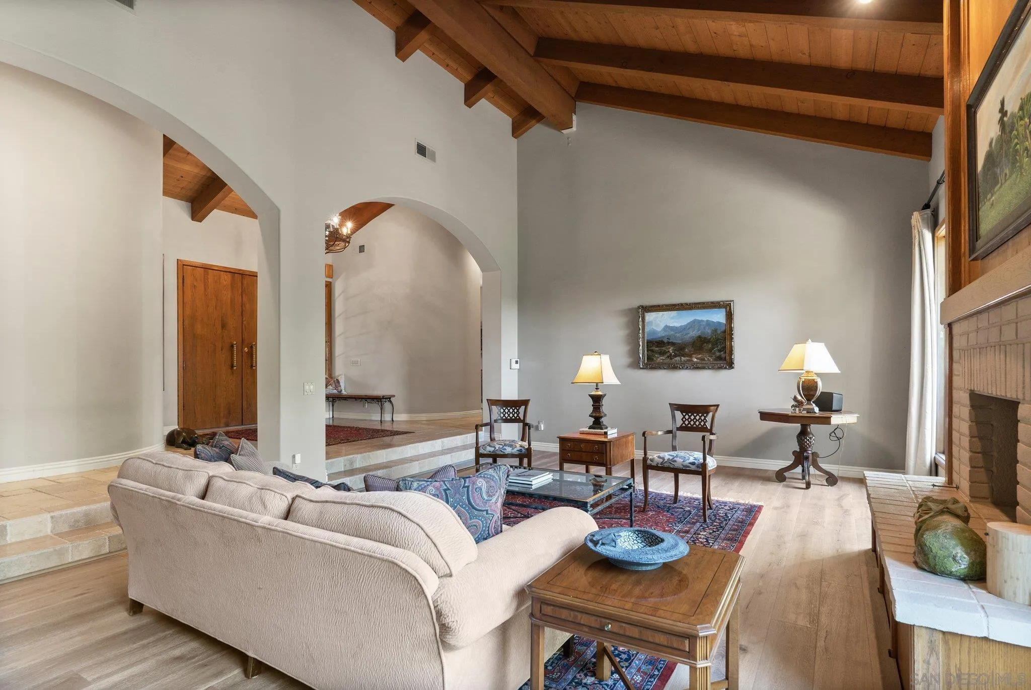 6286 Avenida Floresta Rancho Santa Fe, CA 92067 - Photo 17 of 69 a living room with furniture and a fireplace