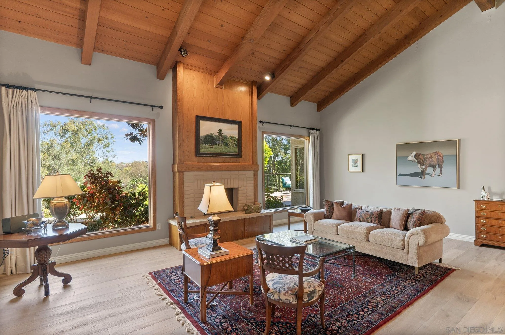 6286 Avenida Floresta Rancho Santa Fe, CA 92067 - Photo 46 of 69 a living room with furniture and a floor to ceiling window