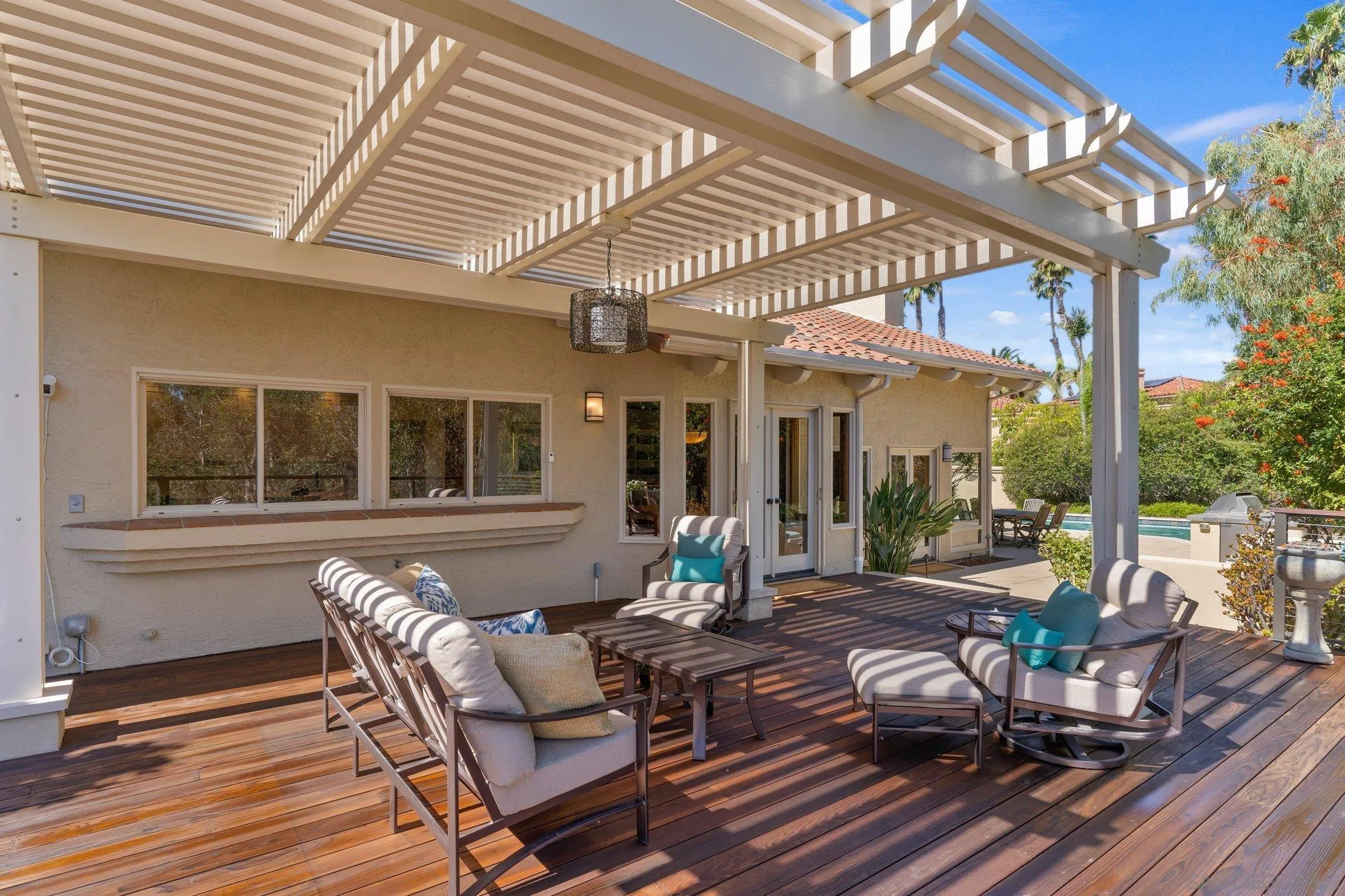 6286 Avenida Floresta Rancho Santa Fe, CA 92067 - Photo 63 of 69 a view of a patio with table and chairs and wooden floor