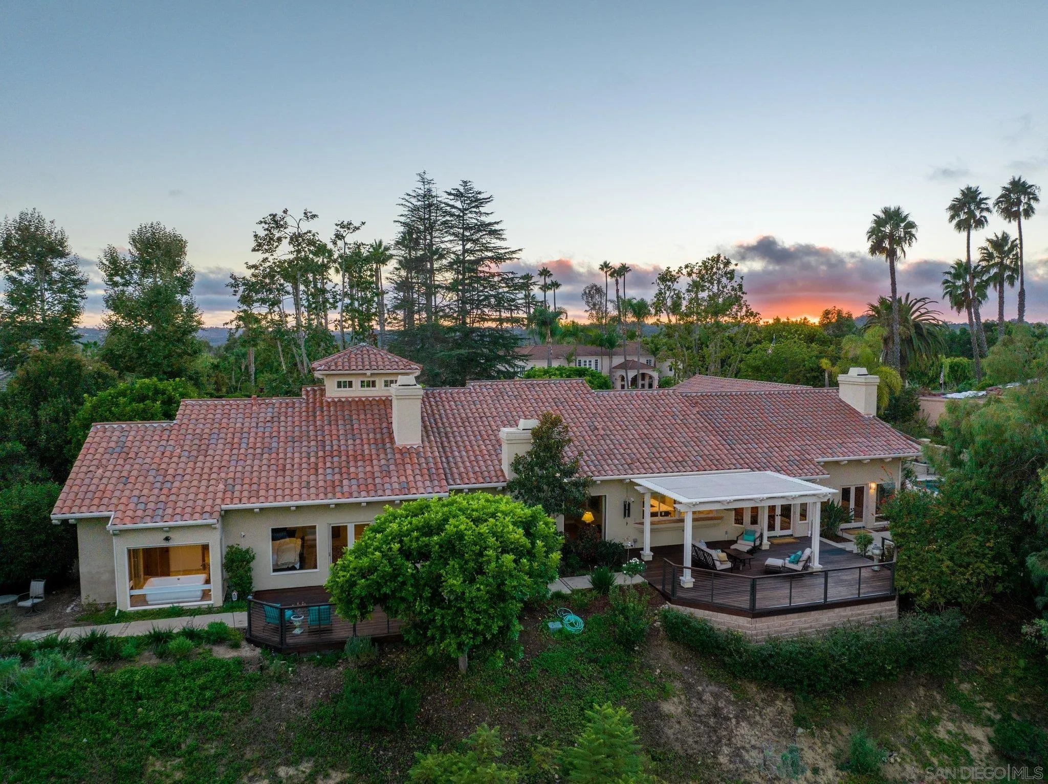 6286 Avenida Floresta Rancho Santa Fe, CA 92067 - Photo 65 of 69 a view of a big house with a big yard plants and large trees