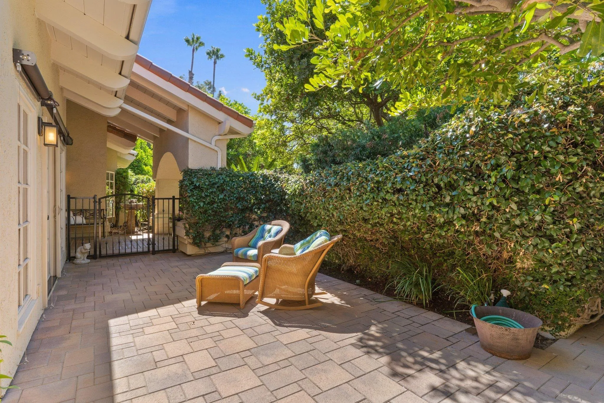 6286 Avenida Floresta Rancho Santa Fe, CA 92067 - Photo 69 of 69 a view of a chair and tables in the patio