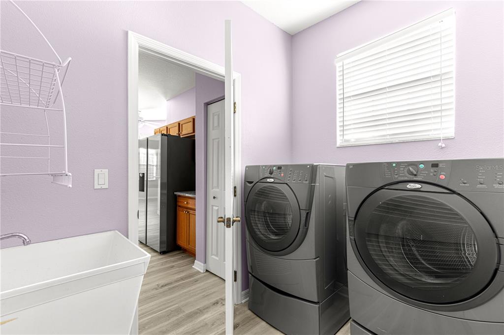 8084 South W 81st Loop Ocala, FL 34476 - Photo 11 of 37 a utility room with dryer and washer