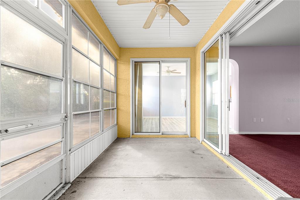8084 South W 81st Loop Ocala, FL 34476 - Photo 28 of 37 a view of empty room with wooden floor and fan