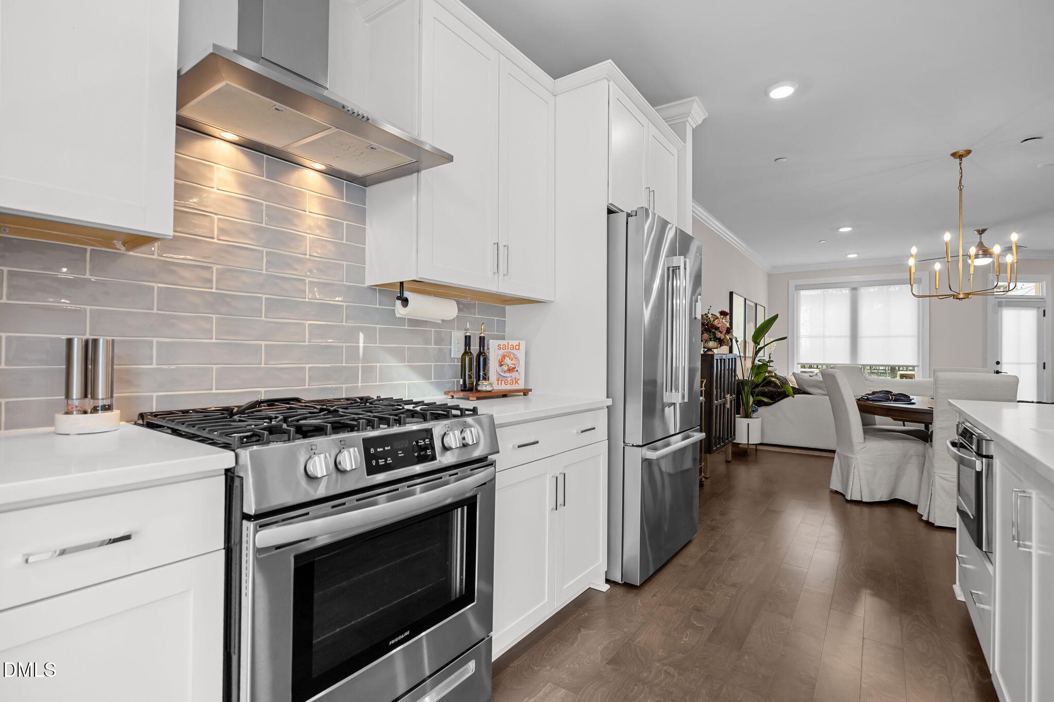 401 Bryan Pointe Drive, Unit 103 Raleigh, NC 27608 - Photo 16 of 43 a kitchen with stove and refrigerator