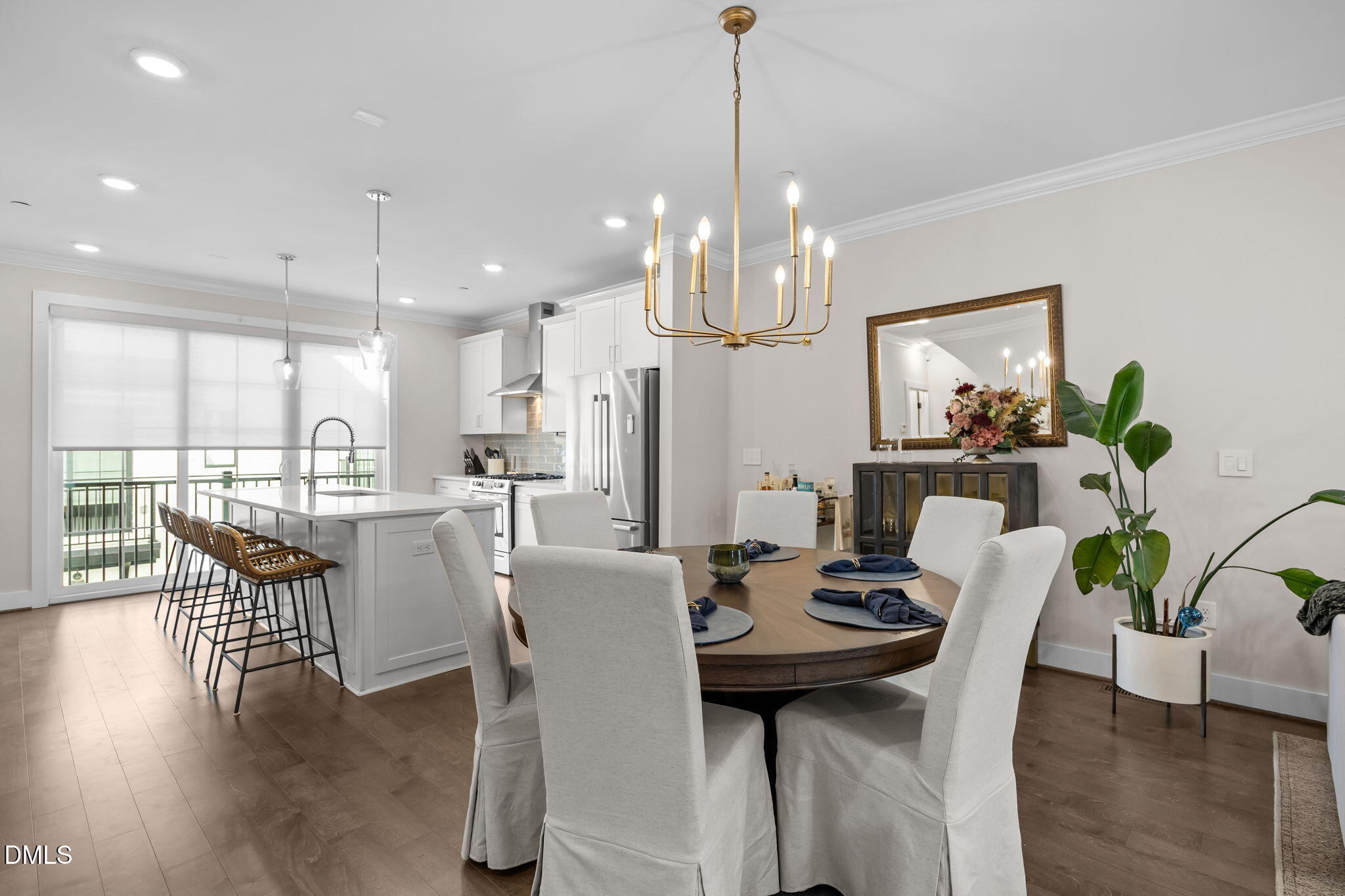 401 Bryan Pointe Drive, Unit 103 Raleigh, NC 27608 - Photo 19 of 43 a view of a dining room with furniture window and wooden floor