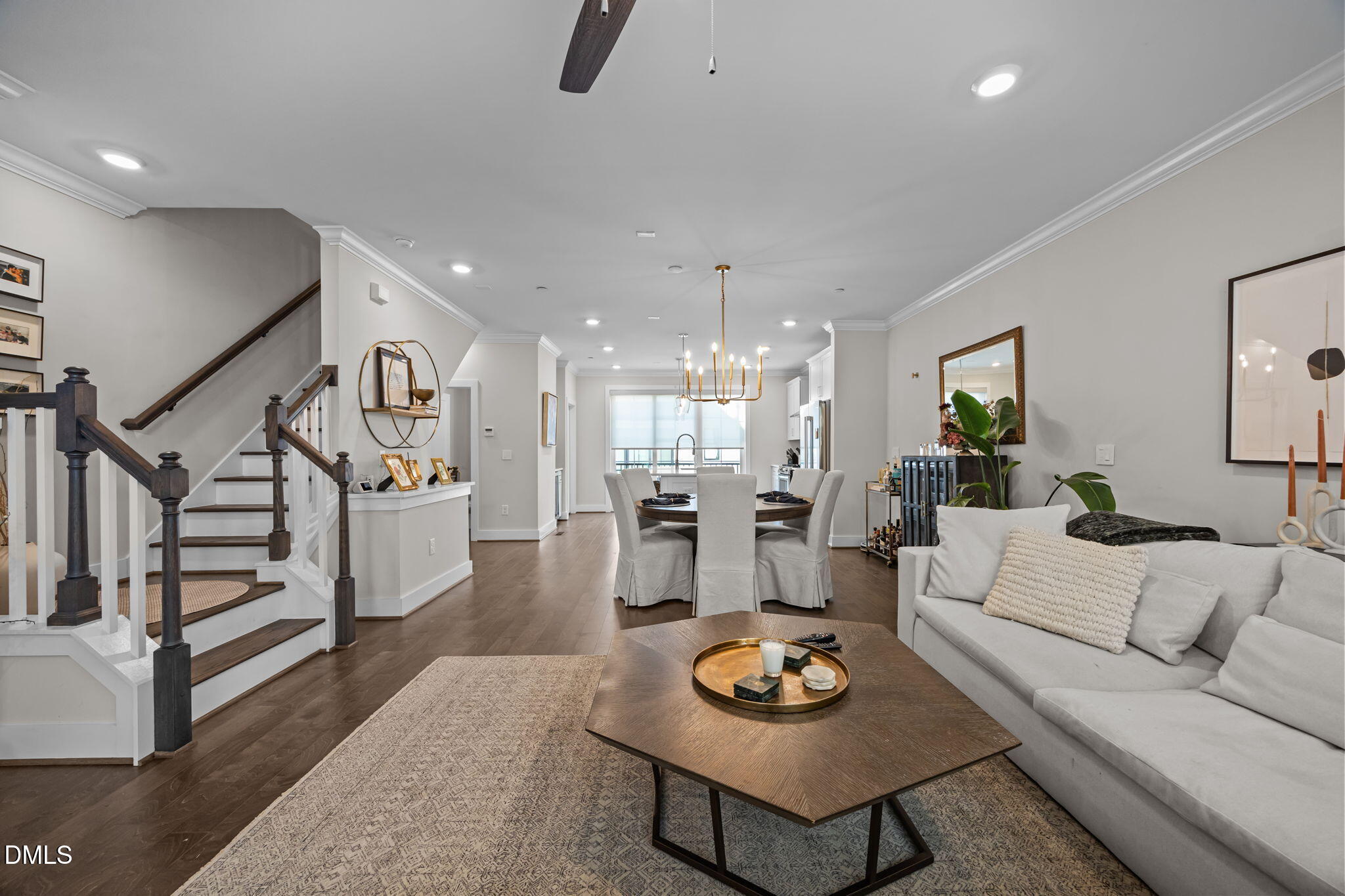 401 Bryan Pointe Drive, Unit 103 Raleigh, NC 27608 - Photo 24 of 43 a living room with furniture and wooden floor