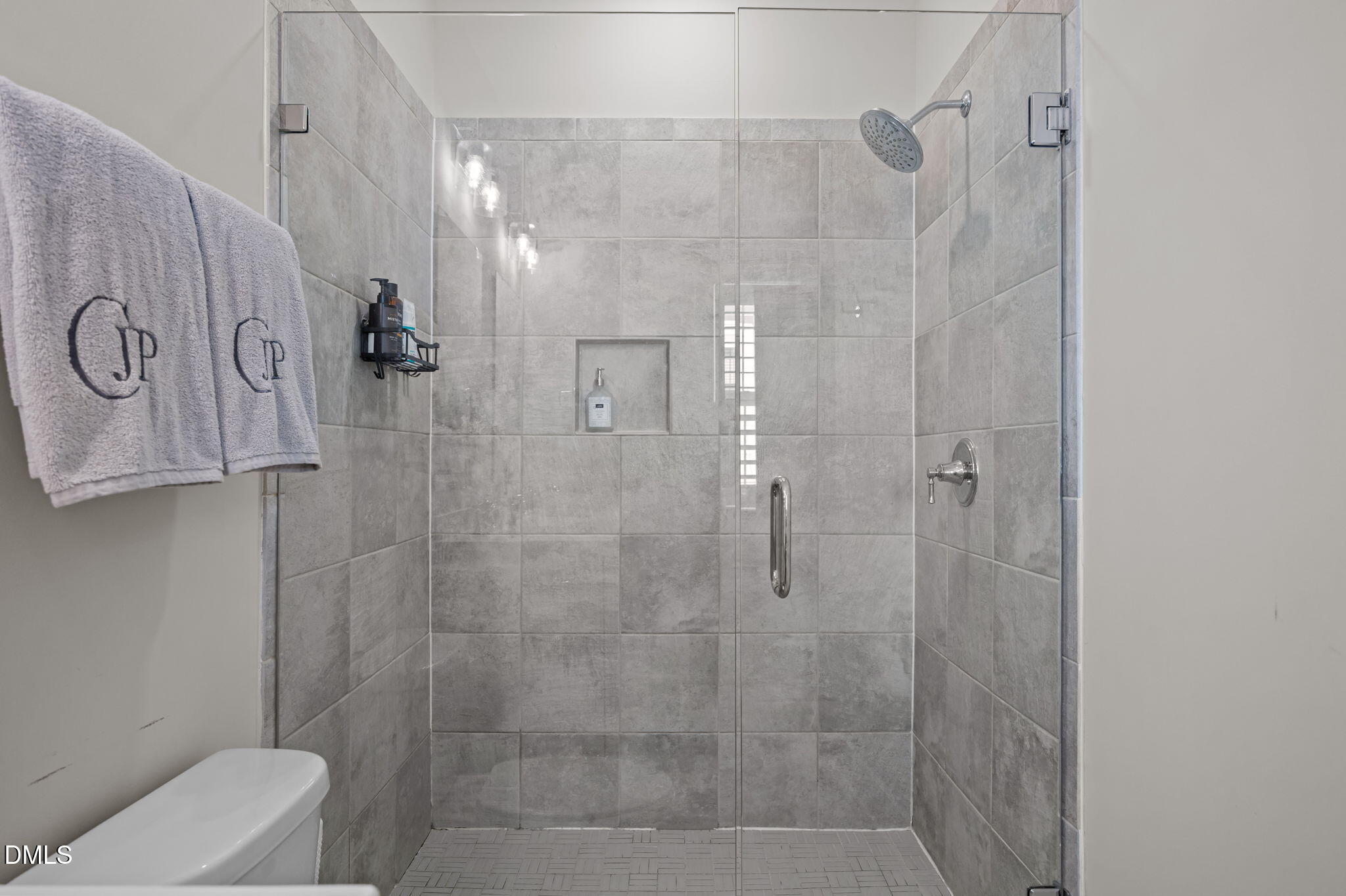 401 Bryan Pointe Drive, Unit 103 Raleigh, NC 27608 - Photo 32 of 43 a bathroom with a shower