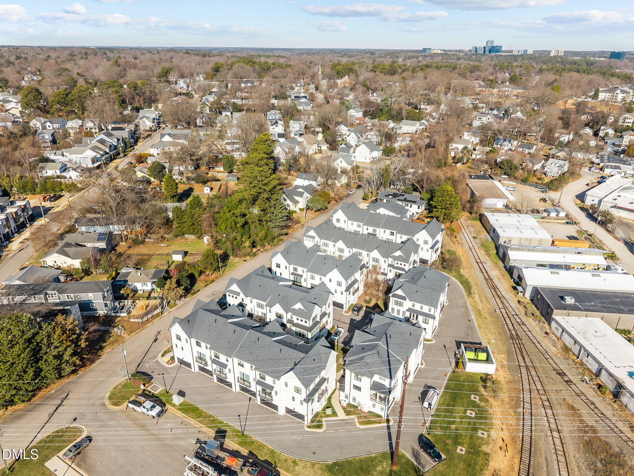 401 Bryan Pointe Drive, Unit 103 Raleigh, NC 27608 - Photo 39 of 43 an aerial view of residential building and parking space