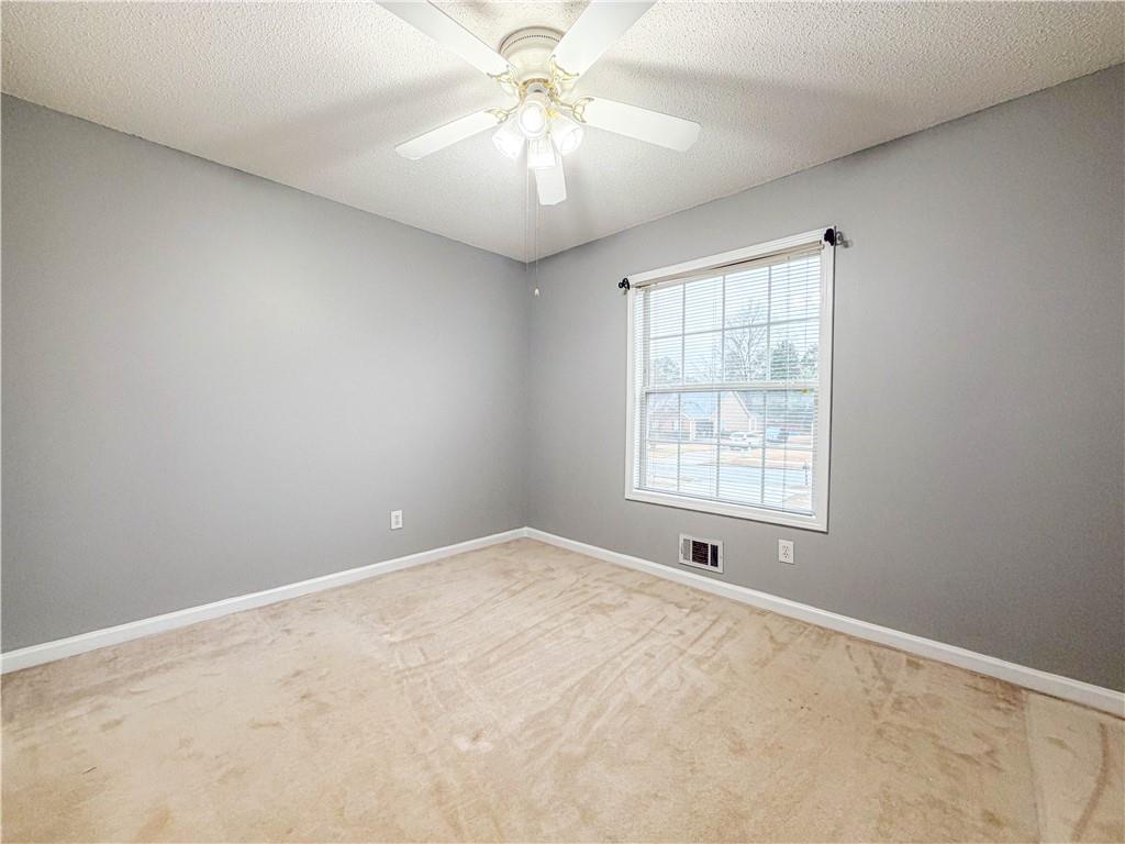 2950 Mandy Court Jonesboro, GA 30236 - Photo 16 of 40 a view of an empty room with a window