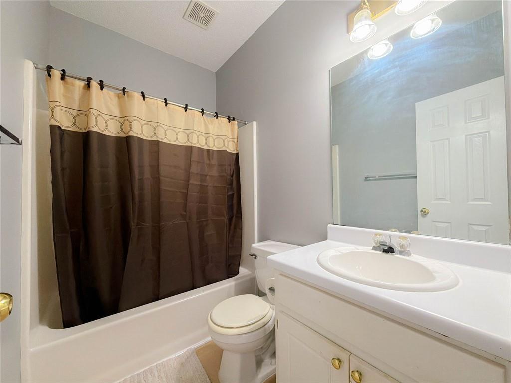 2950 Mandy Court Jonesboro, GA 30236 - Photo 26 of 40 a bathroom with a sink and a toilet