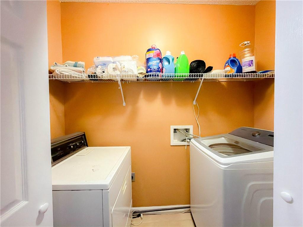 2950 Mandy Court Jonesboro, GA 30236 - Photo 28 of 40 a utility room with dryer and washer