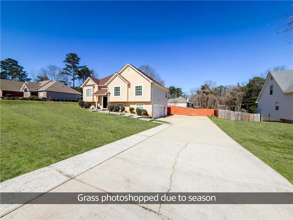 2950 Mandy Court Jonesboro, GA 30236 - Photo 3 of 40 a view of a house with a yard