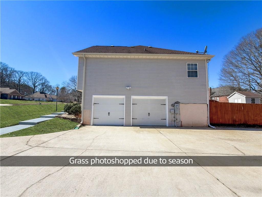 2950 Mandy Court Jonesboro, GA 30236 - Photo 4 of 40 a view of a house with a yard