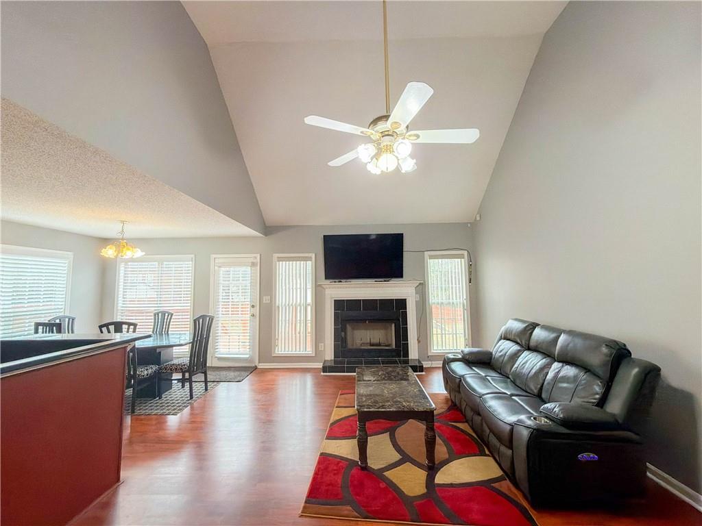 2950 Mandy Court Jonesboro, GA 30236 - Photo 6 of 40 a living room with furniture fireplace and a flat screen tv