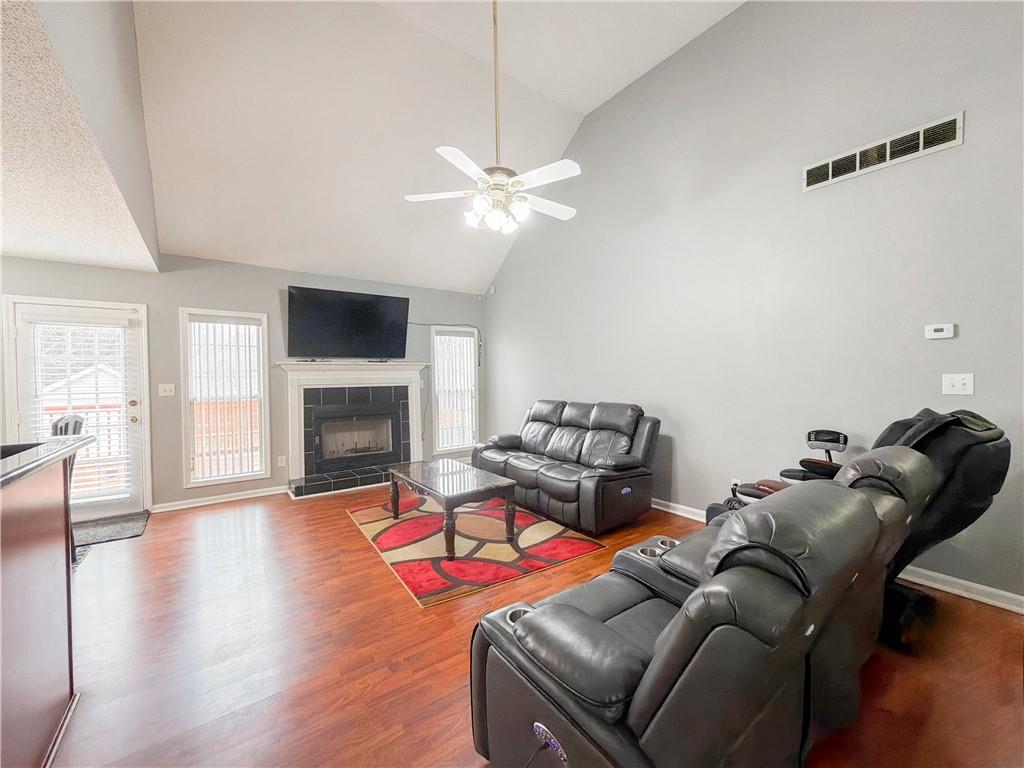 2950 Mandy Court Jonesboro, GA 30236 - Photo 7 of 40 a living room with furniture fireplace and a flat screen tv