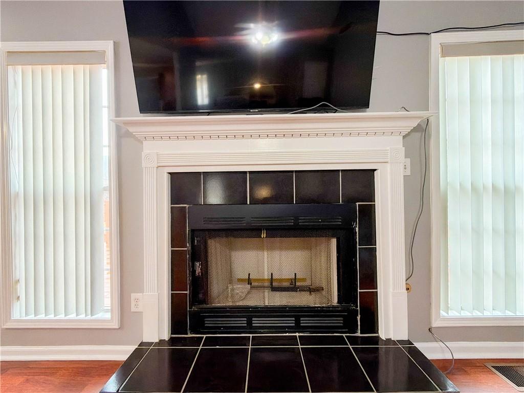 2950 Mandy Court Jonesboro, GA 30236 - Photo 8 of 40 a room with fireplace and window