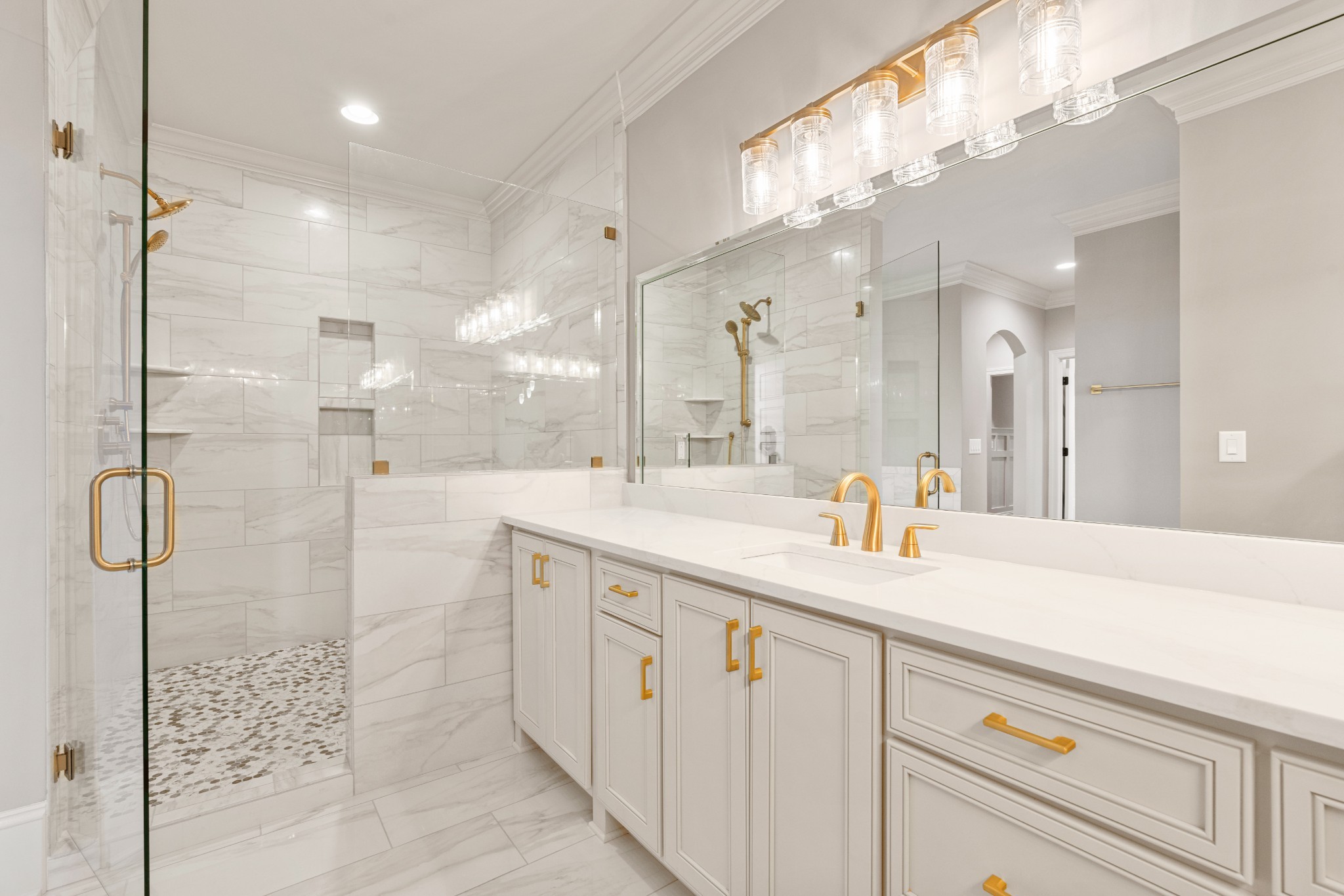 4818 Hickory Ridge Road Lebanon, TN 37087 - Photo 18 of 73 a bathroom with a shower sink and mirror