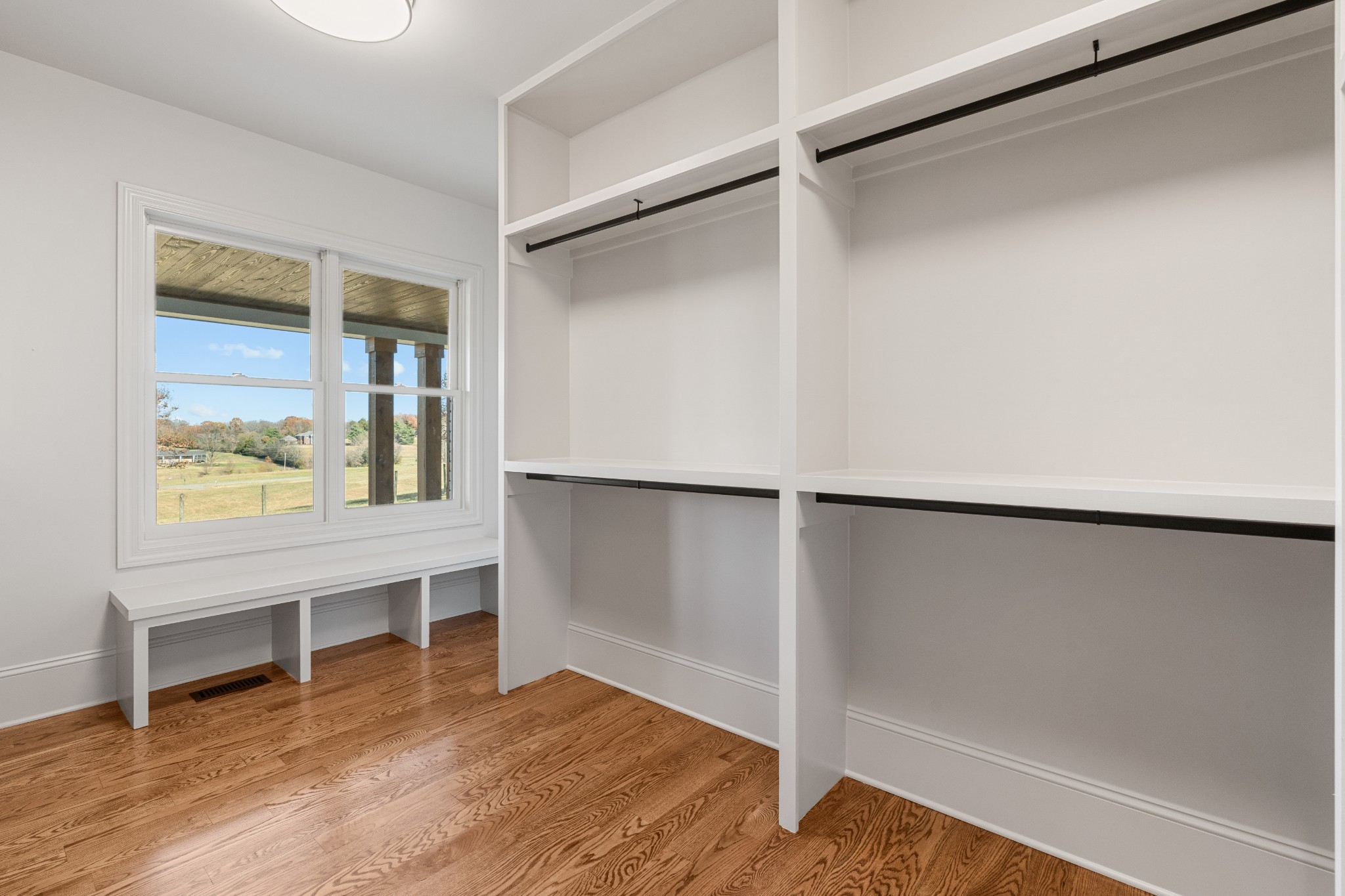 4818 Hickory Ridge Road Lebanon, TN 37087 - Photo 22 of 73 an empty room with wooden floor and windows