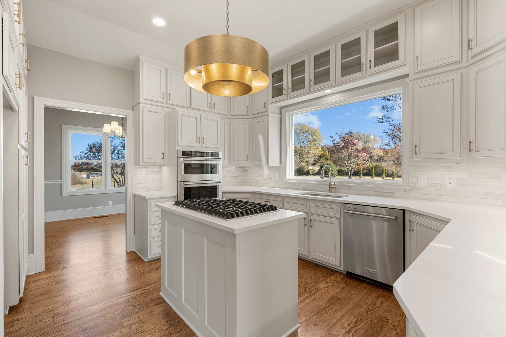 4818 Hickory Ridge Road Lebanon, TN 37087 - Photo 25 of 73 a kitchen with stainless steel appliances a stove cabinets and wooden floor