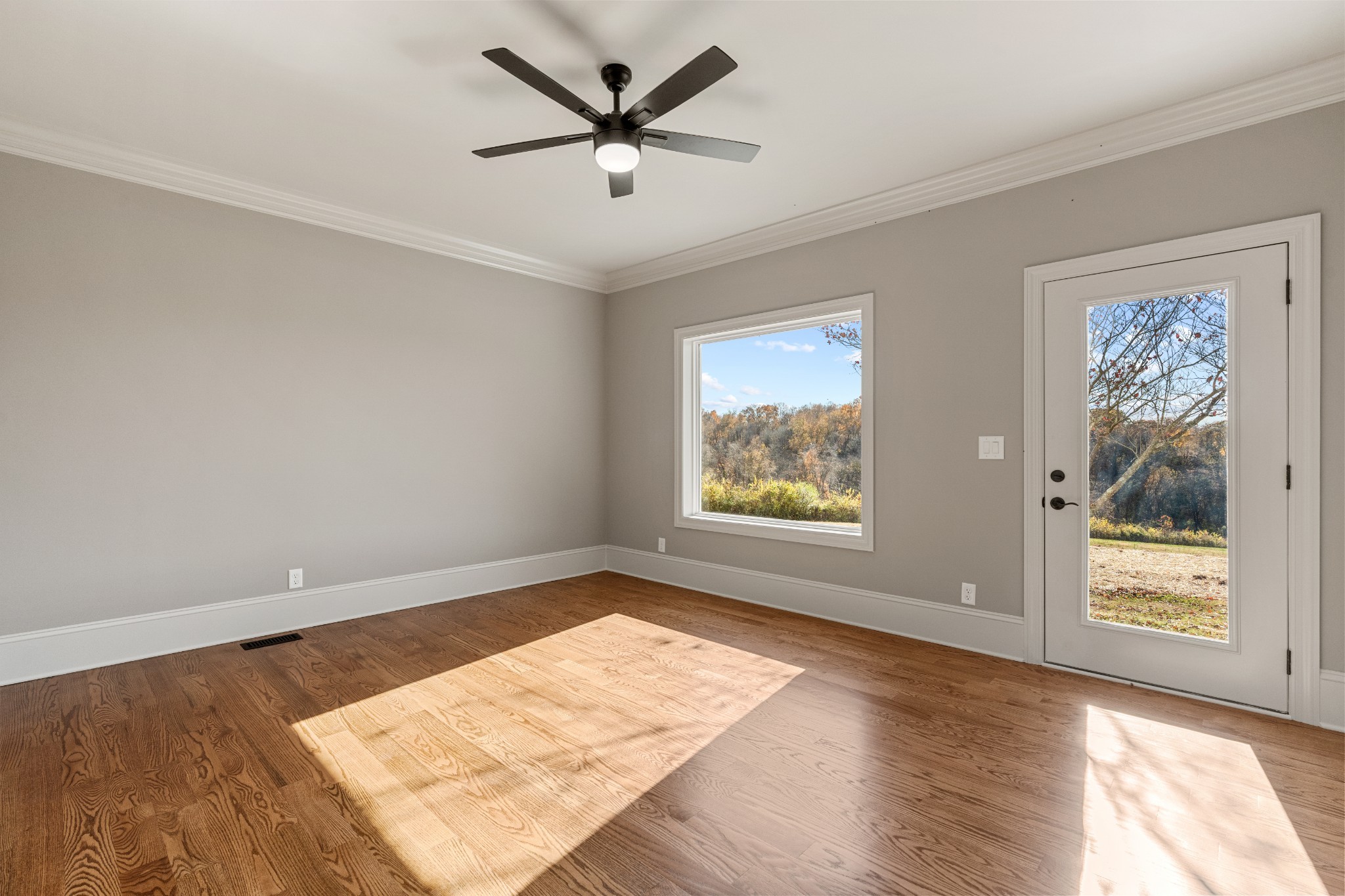 4818 Hickory Ridge Road Lebanon, TN 37087 - Photo 37 of 73 an empty room with wooden floor and windows
