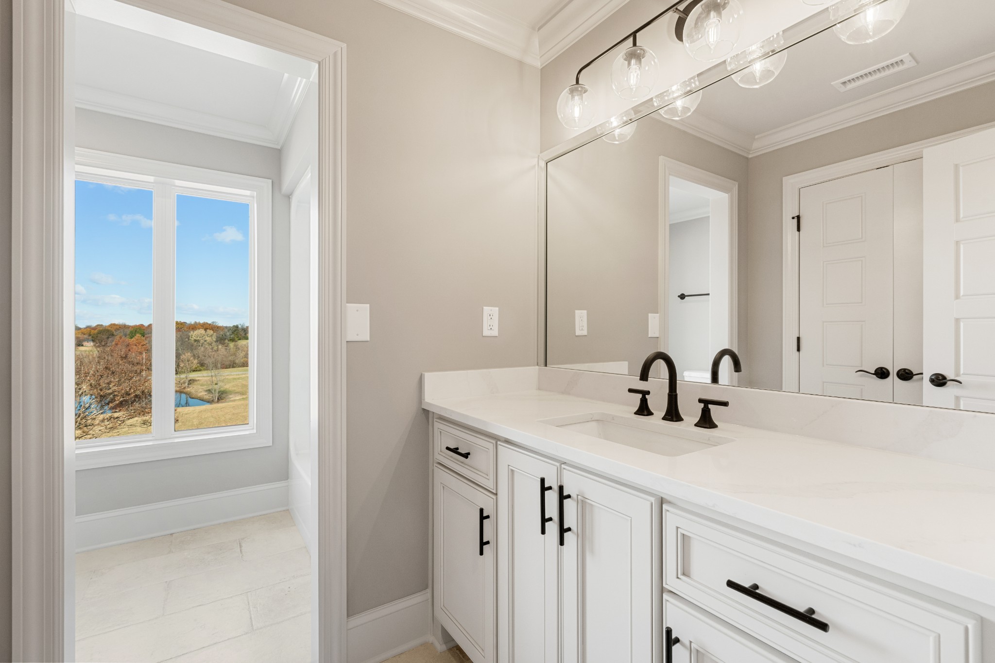 4818 Hickory Ridge Road Lebanon, TN 37087 - Photo 55 of 73 a bathroom with a sink and a mirror