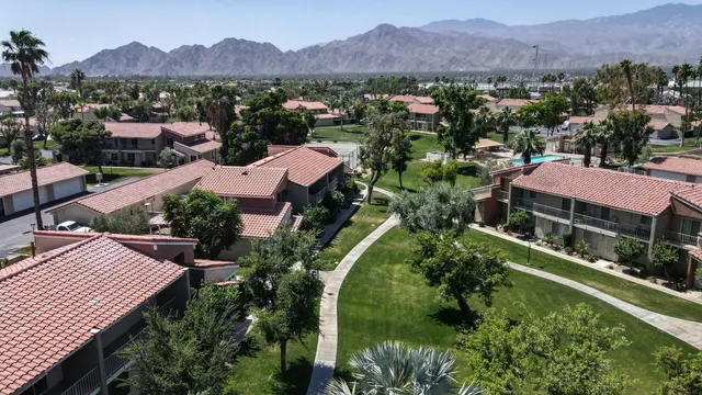 a view of a city with a lake
