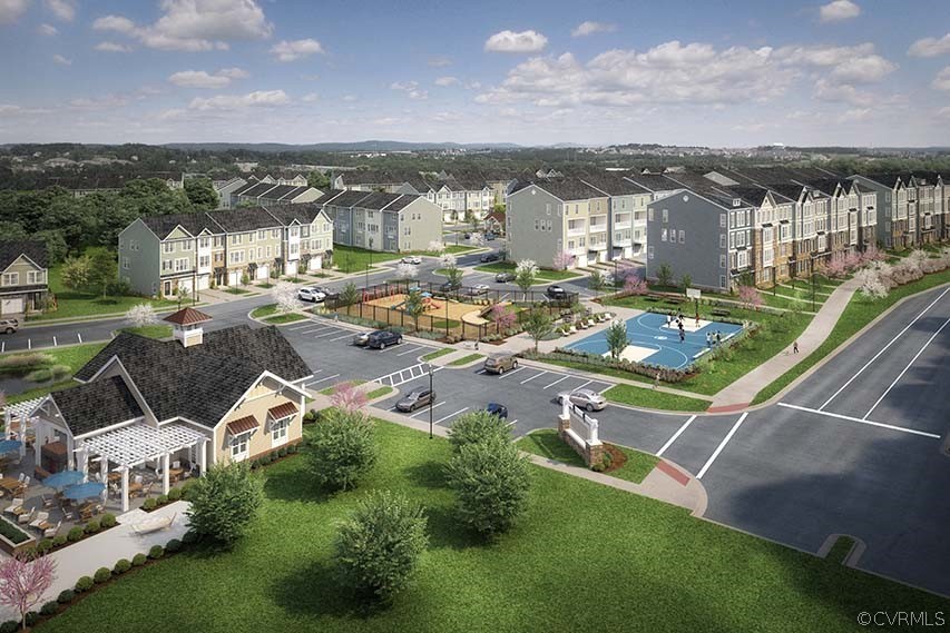 607 Rivanna Hill Road Glen Allen, VA 23060 - Photo 21 of 30 an aerial view of a house with a garden and lake view