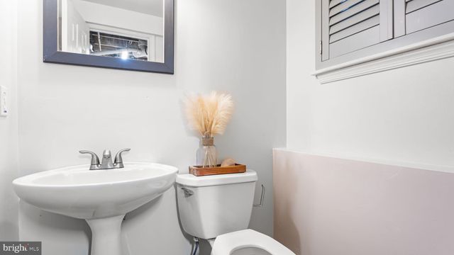 a utility room with a sink a washer and dryer