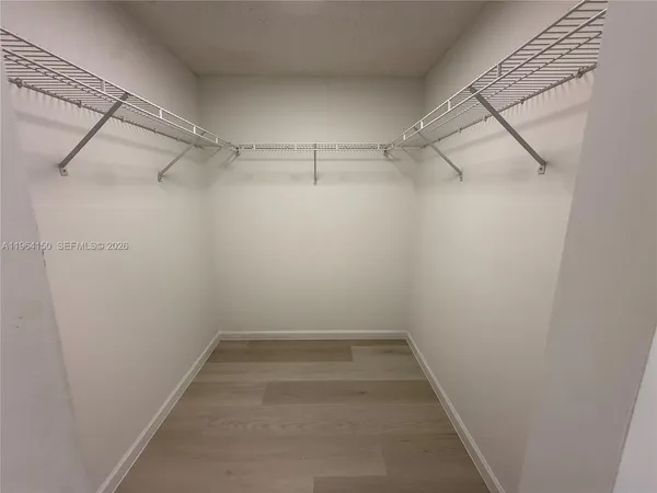 a view of a room with racks on the wall