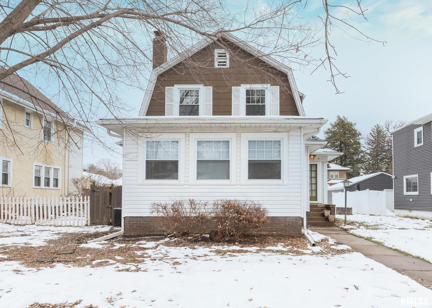 2416 12th Street Moline, IL 61265 - Photo 1 of 41 a front view of a house