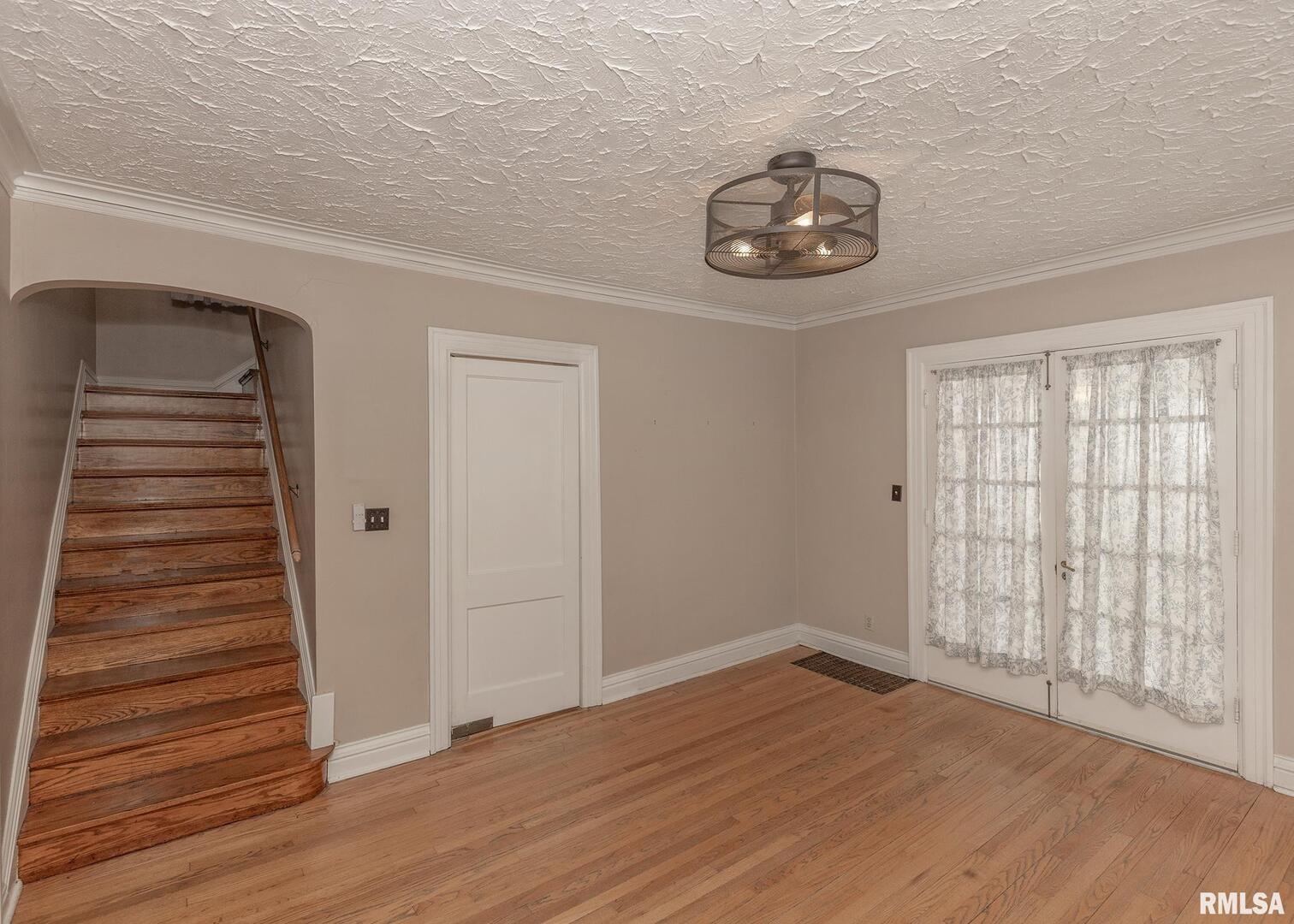 2416 12th Street Moline, IL 61265 - Photo 13 of 41 wooden floor in an empty room with a window