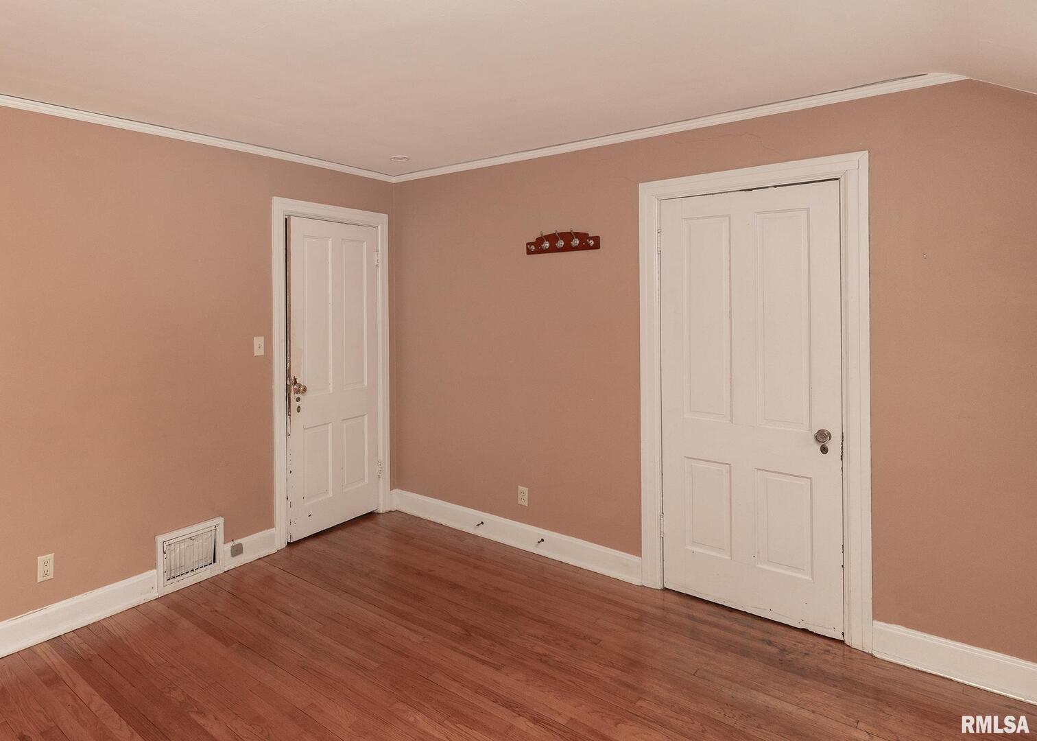 2416 12th Street Moline, IL 61265 - Photo 30 of 41 a view of an empty room with wooden floor