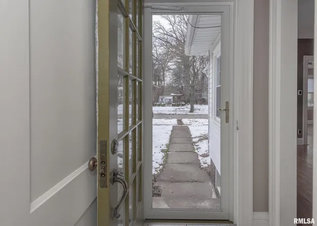 a bathroom with a glass door shower and sink