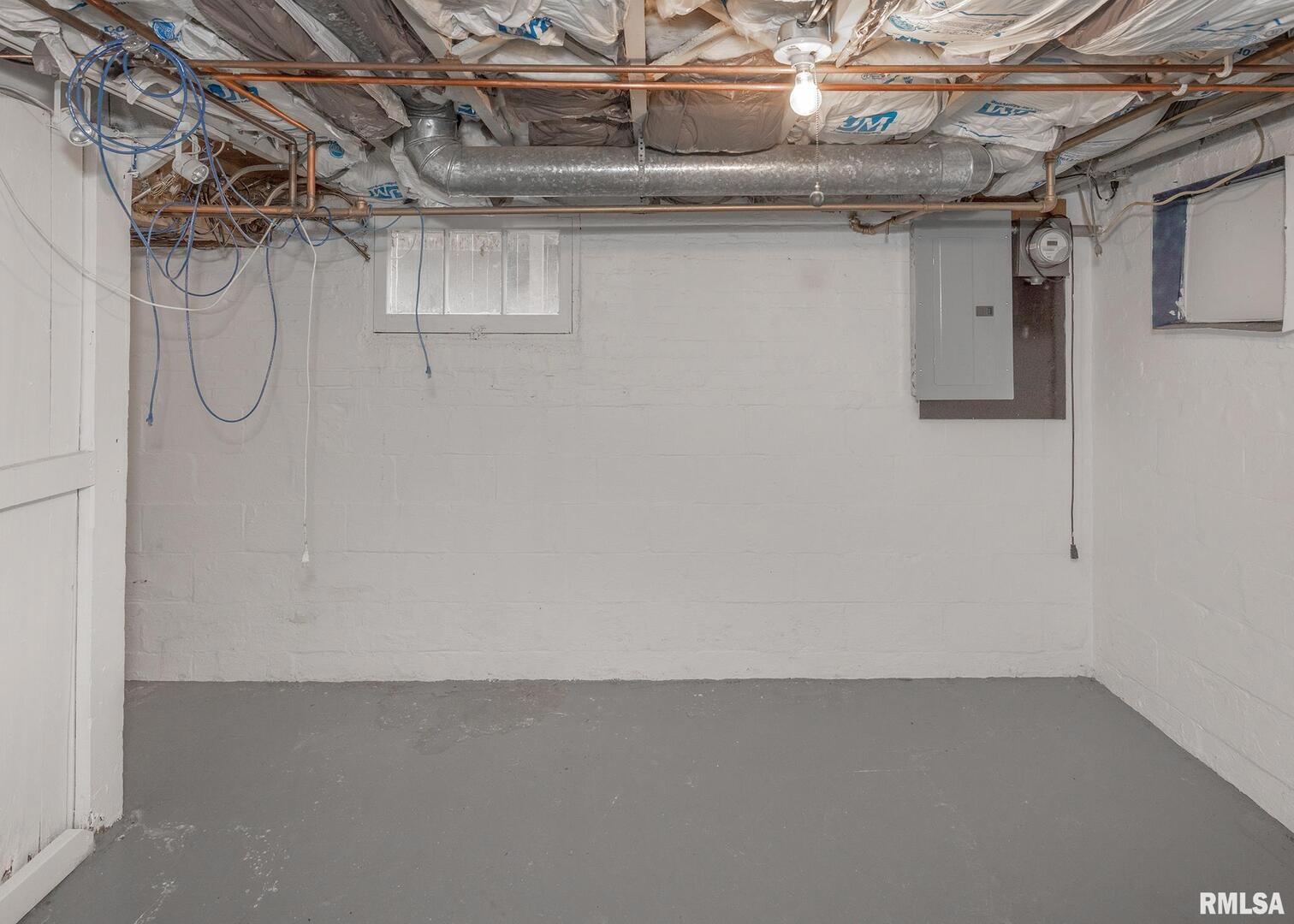 2416 12th Street Moline, IL 61265 - Photo 33 of 41 a view of a room with racks on the wall