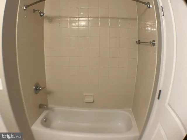 a close view of a bathtub in bathroom