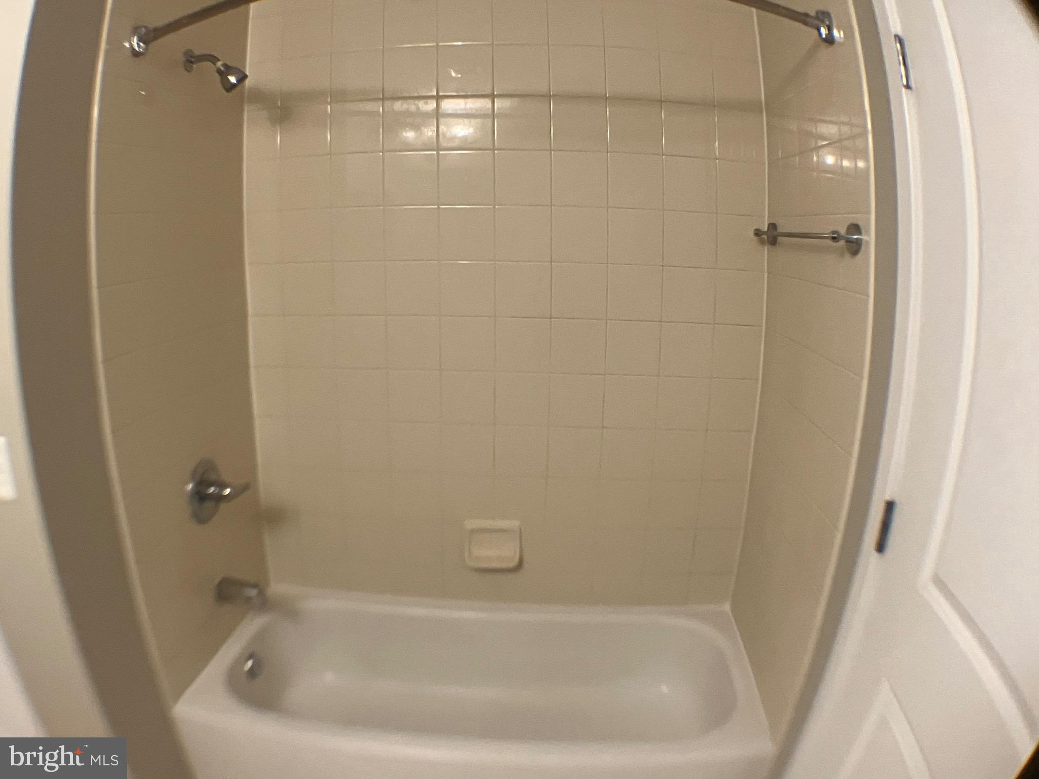 2001 15th Street North, Unit 319 Arlington, VA 22201 - Photo 17 of 19 a close view of a bathtub in bathroom