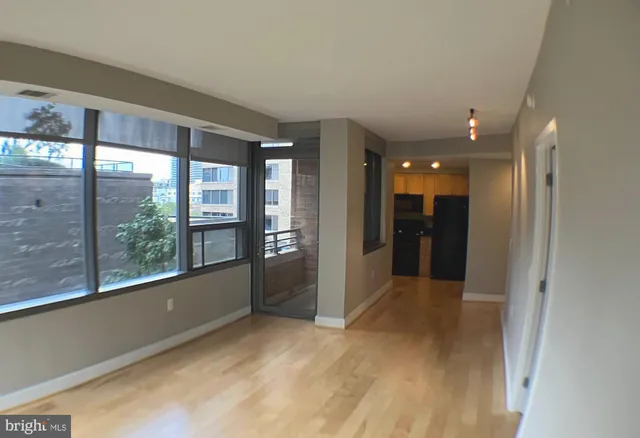 a view of hallway with a large window