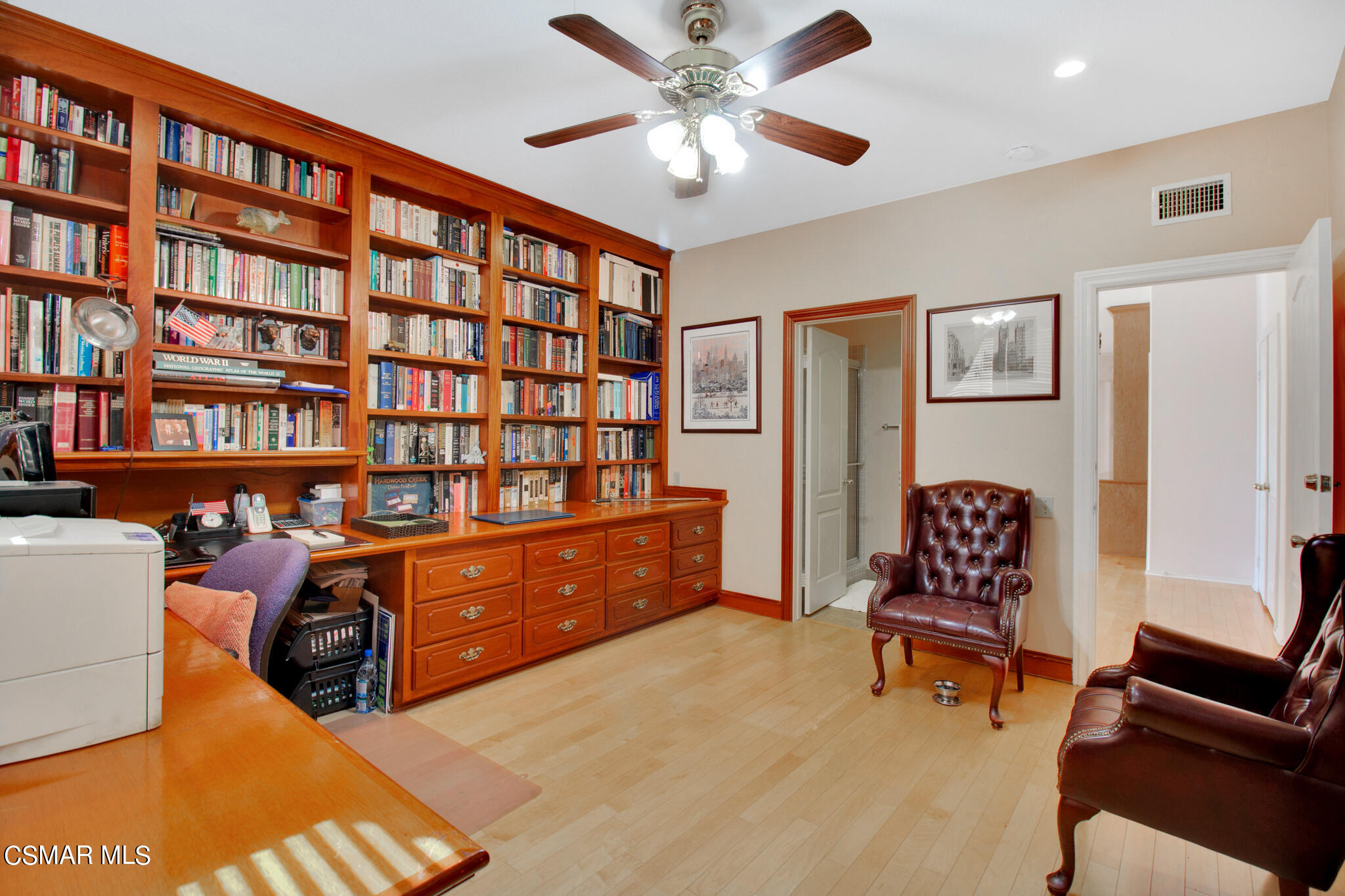 11603 Pinedale Road Moorpark, CA 93021 - Photo 38 of 54 a room with furniture and book shelf