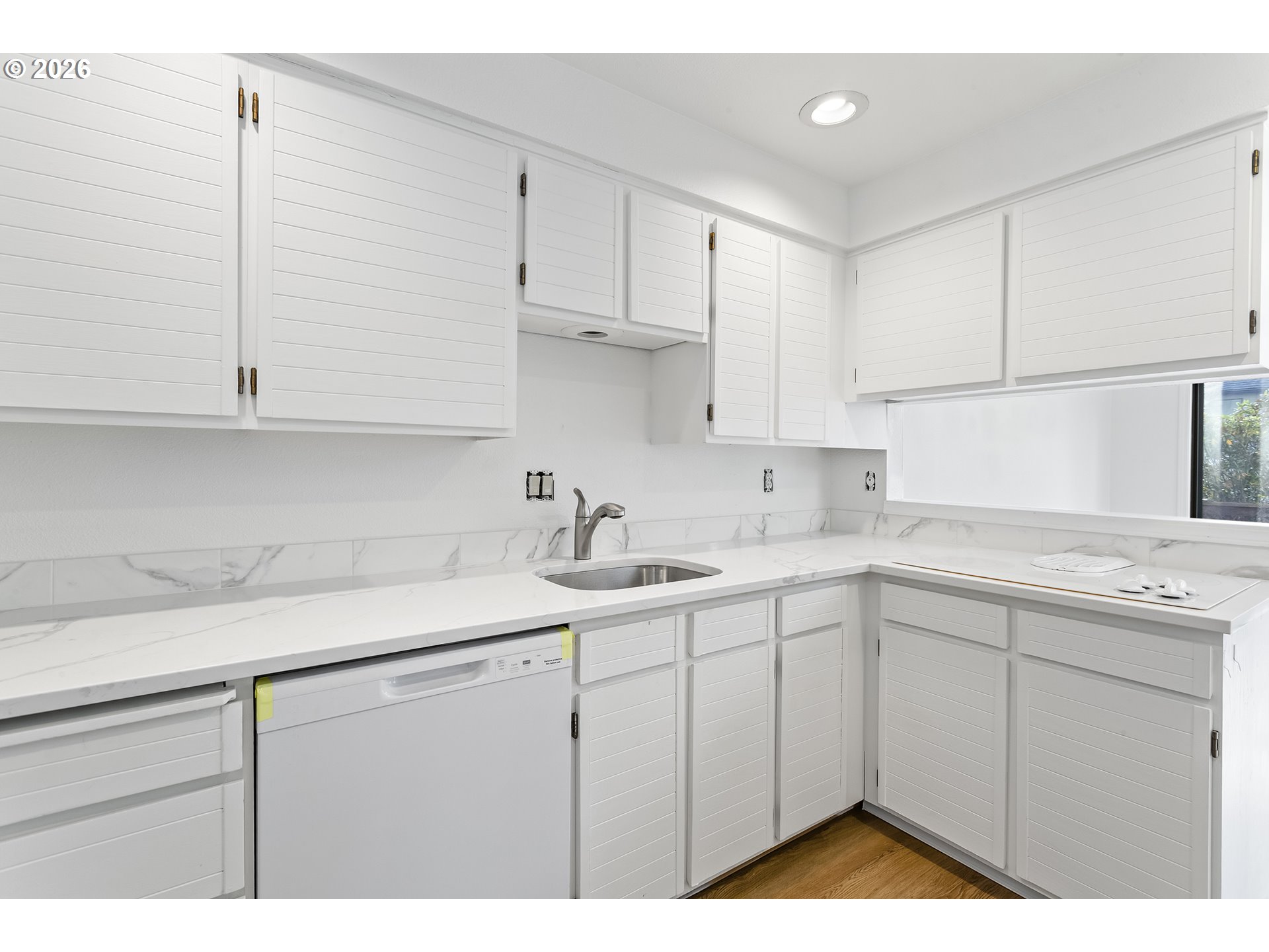 3676 Spring Lane Lake Oswego, OR 97035 - Photo 15 of 36 a kitchen with a sink cabinets and appliances