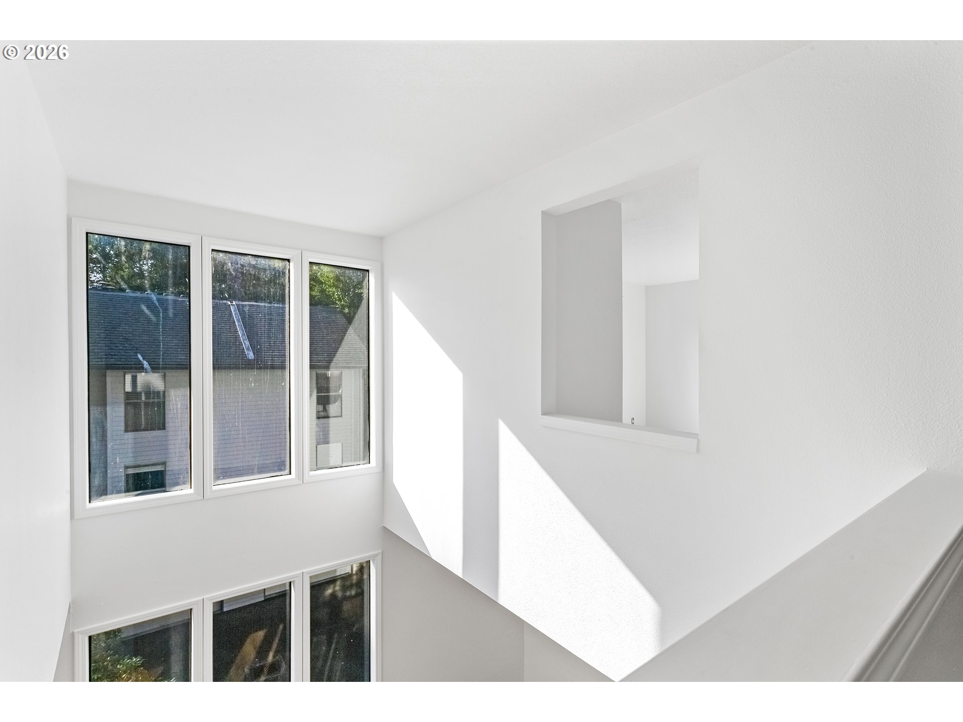 3676 Spring Lane Lake Oswego, OR 97035 - Photo 27 of 36 a view of a living room with windows