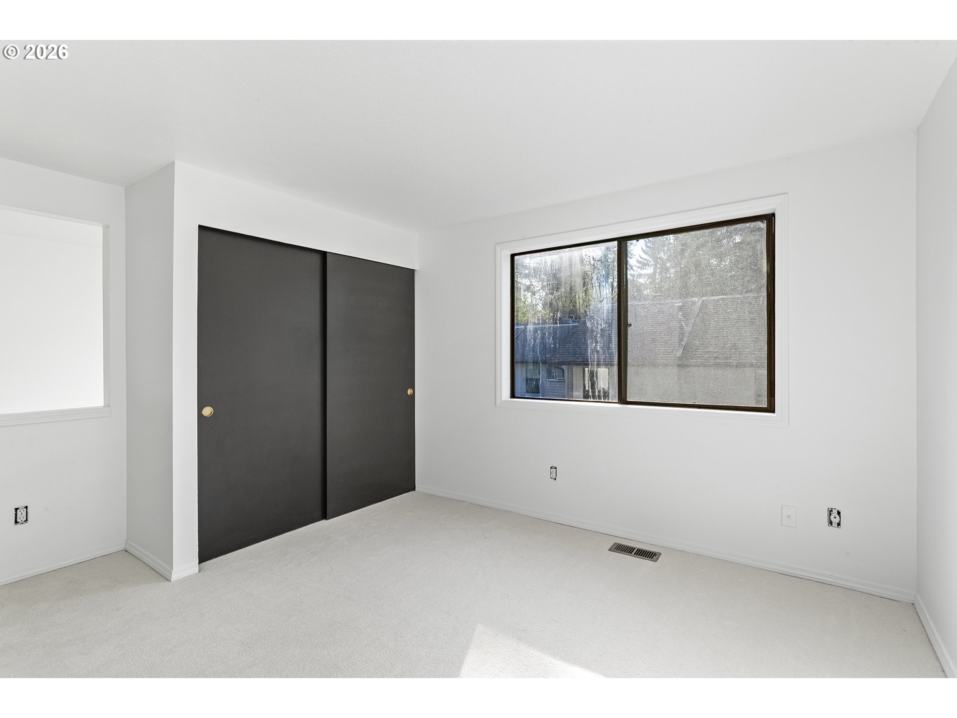 3676 Spring Lane Lake Oswego, OR 97035 - Photo 30 of 36 a view of an empty room with a window