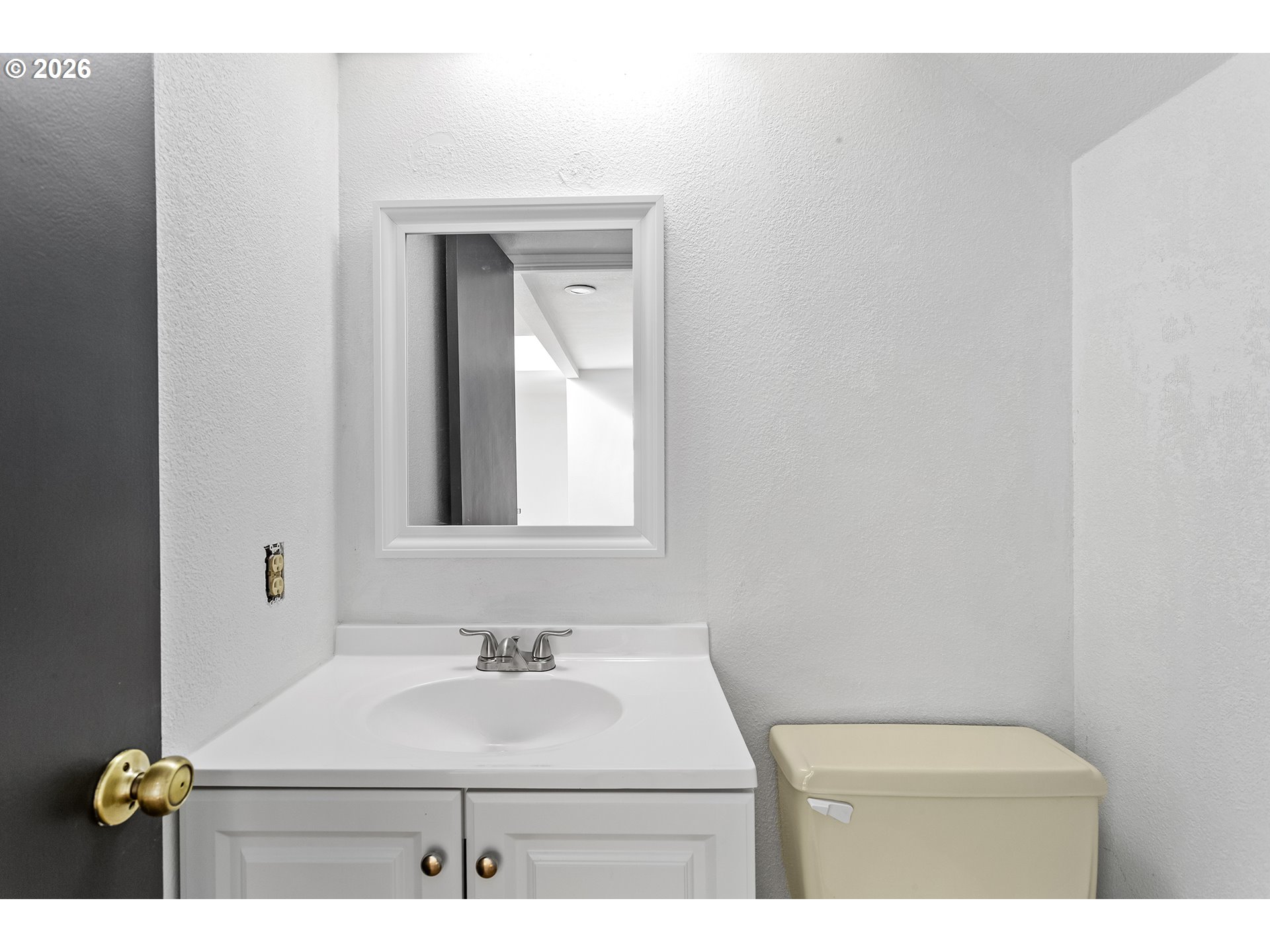 3676 Spring Lane Lake Oswego, OR 97035 - Photo 33 of 36 a bathroom with a sink and a mirror