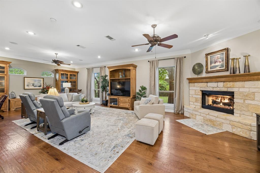 2930 Falcon Way Midlothian, TX 76065 - Photo 8 of 40 a living room with furniture and a fireplace