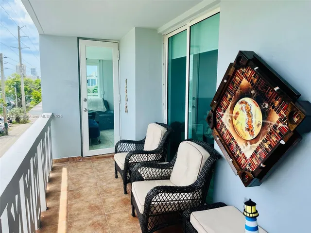 a living room with furniture and a chair