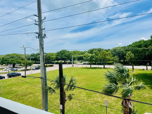 a view of a swimming pool with a garden