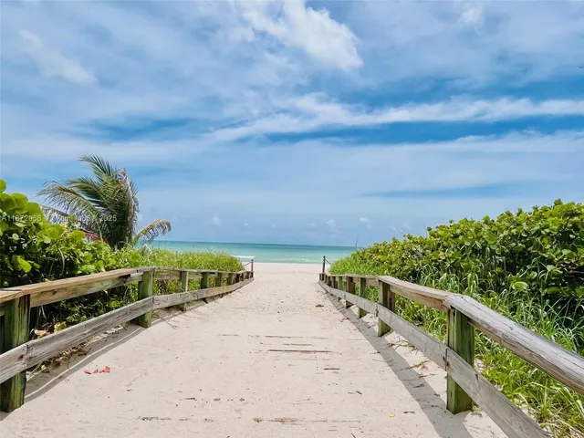 a view of balcony with wooden floor and outdoor space