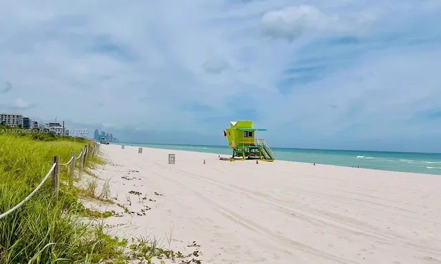 a view of a swimming pool and an outdoor space