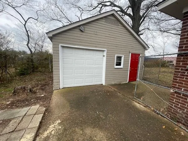 a view of backyard of house