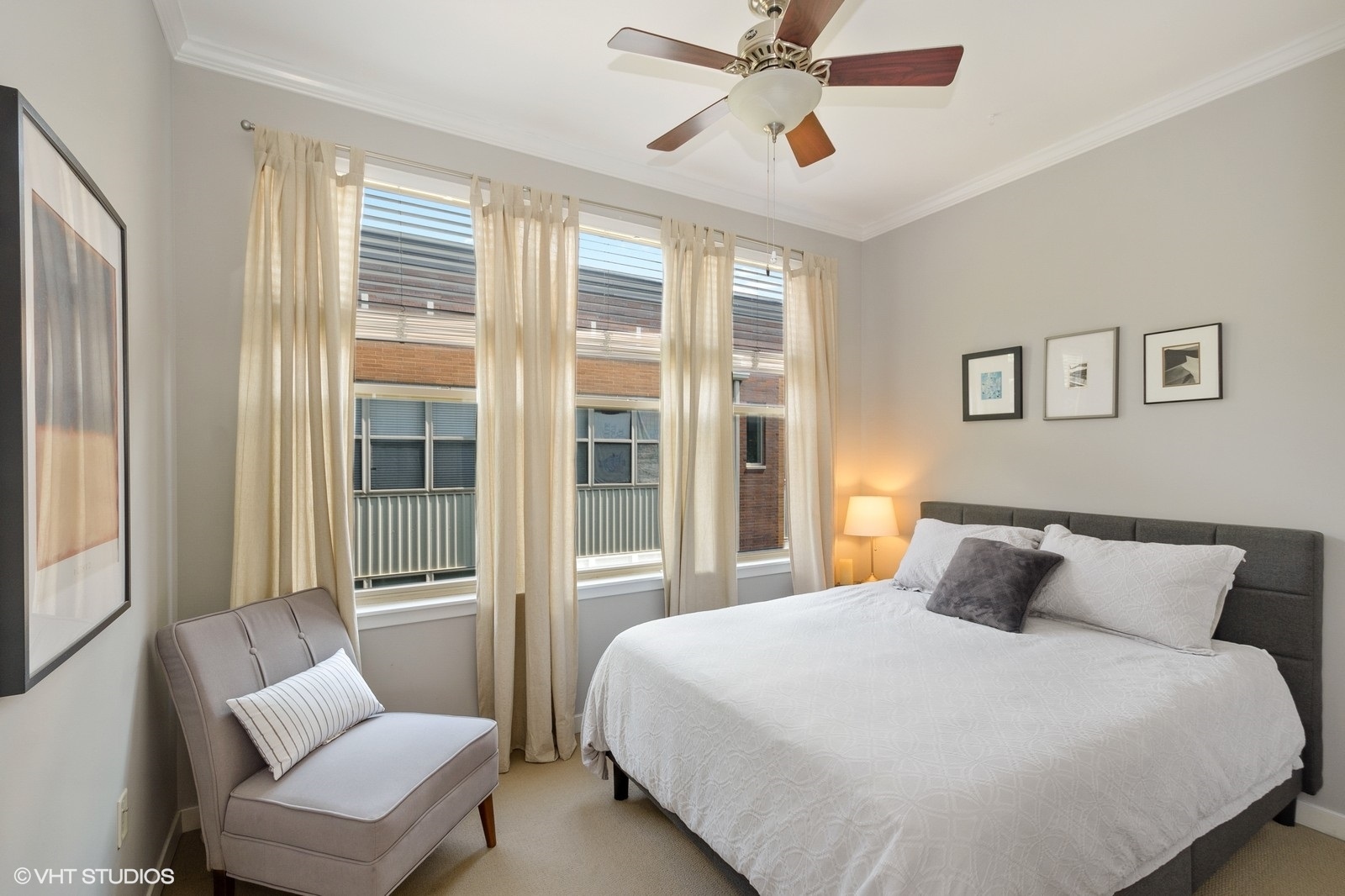 1244 West Monroe Street, Unit 4 Chicago, IL 60607 - Photo 13 of 16 a bedroom with a large bed and a window