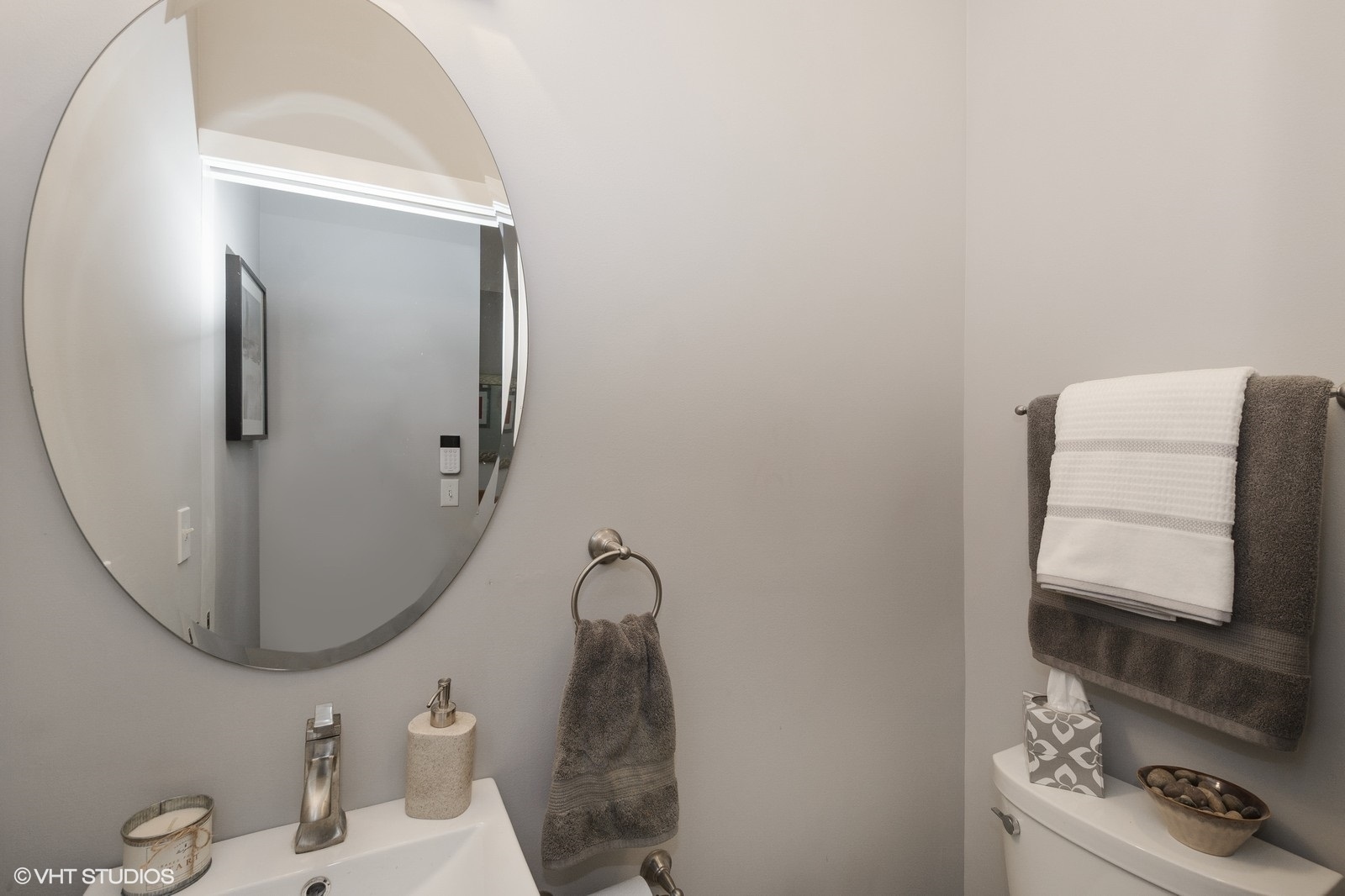 1244 West Monroe Street, Unit 4 Chicago, IL 60607 - Photo 15 of 16 a bathroom with a sink and mirror